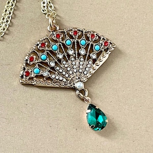 Colorful vintage style, gold tone jeweled fan imitation ruby, turquoise, rhinestone, pearl jewels, emerald green drop bead on 18 inch chain