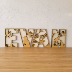 3D wooden letters for first name. Theme and color of your choice animals jungle savannah dinosaur unicorn planet forest dog etc...