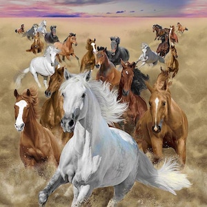 May include: A herd of horses running through a sandy desert landscape under a colorful sunset sky. The horses are brown, white, and black, and they are all running in the same direction. The sand is kicking up behind them as they run.