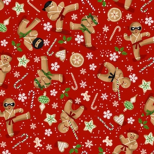 May include: A festive red background features a repeating pattern of gingerbread men in karate poses, interspersed with snowflakes, candy canes, and Christmas ornaments. The gingerbread men wear belts and headbands. Holiday-themed design.