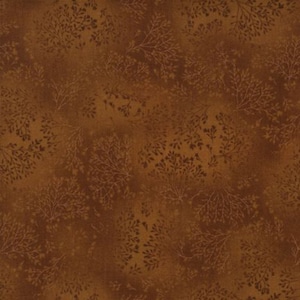 May include: A brown fabric with a subtle, repeating pattern of small, light brown branches. The fabric has a slightly textured surface.