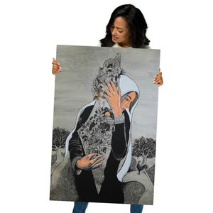 May include: A woman holds a black and white illustration of a woman holding a city skyline shaped like a map. The woman in the illustration is wearing a white headscarf and a black dress. The background is a light gray.