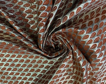Tela: Jacquard de seda y poliéster brocado de hojas color naranja quemado de 45" de ancho