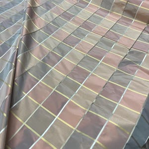 Beautiful multi check combination soft Jersy plaid 60” wide.