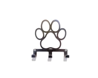 May include: Silver metal paw print key holder with four hooks.