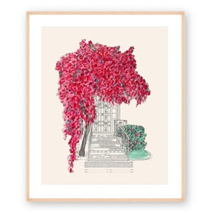 May include: Watercolor print of a house entrance with a vibrant red flowering tree. The artwork features a detailed black and white drawing of the gate, stairs, and surrounding greenery, set against a cream background, framed in a light wood.