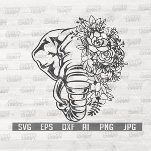 Puede incluir: Diseño floral de elefante en blanco y negro. La cabeza y la trompa del elefante están detalladas con un ramo de flores. La imagen incluye los tipos de archivo: SVG, EPS, DXF, AI, PNG y JPG.