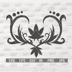 May include: A black and white silhouette of a cannabis leaf with decorative swirls and leaves around it, forming a heart shape. The image is on a white wood background.