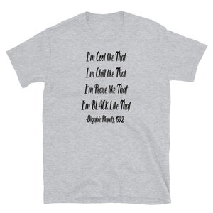 May include: Gray t-shirt with black text that reads "I'm Cool like That I'm Chill like That I'm Peace like That I'm BLACK Like That -Digable Planets, 1992"