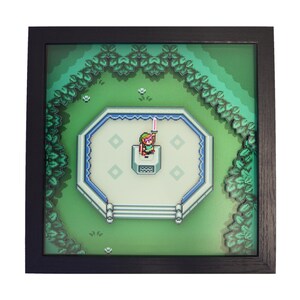May include: Framed pixel art depicting a scene from a video game. The artwork features a character holding a sword on a platform surrounded by a green landscape. The frame is black, and the overall design is reminiscent of classic 8-bit graphics.
