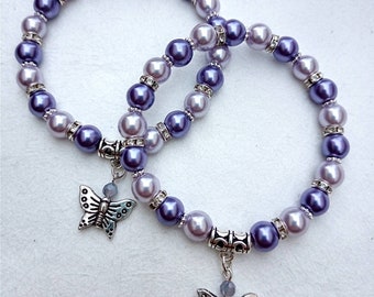 Lilac butterfly handmade beaded bracelet, with mixed lilac glass pearls, diamonte rondelles & tibetan silver charm. Beautiful little gift.