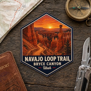 May include: A hexagonal sticker featuring a sunset landscape of Bryce Canyon with orange rock formations and a winding trail. The text reads NAVAJO LOOP TRAIL BRYCE CANYON Utah. The design includes a dark blue border and bold lettering.