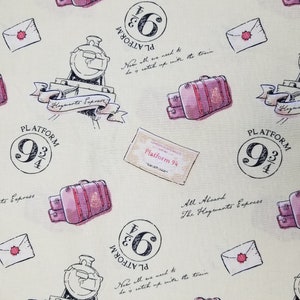 May include: A cream-colored fabric with a repeating pattern of luggage, envelopes, and train-related imagery. The pattern includes the text "Platform 9 3/4" and "All Aboard The Hogwarts Express".