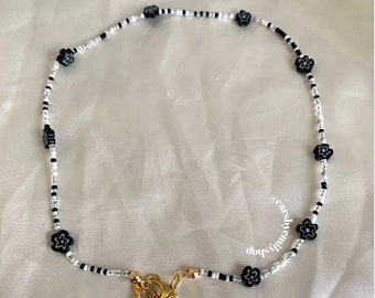 Cool quirky handmade beaded white and black millefiori flower choker short necklace, with gold plated flower toggle clasp closure