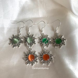 Silver Sun Dangle Earrings: Orange or Green Center on silver hypoallergenic surgical steel hooks