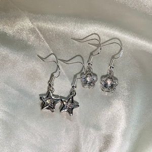 Cool silver crystal cage flower / star on silver plated hooks. Perfect as a gift