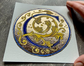 Vergulde filigraankalligrafiekunst: letter C, verlichte woondecoratie