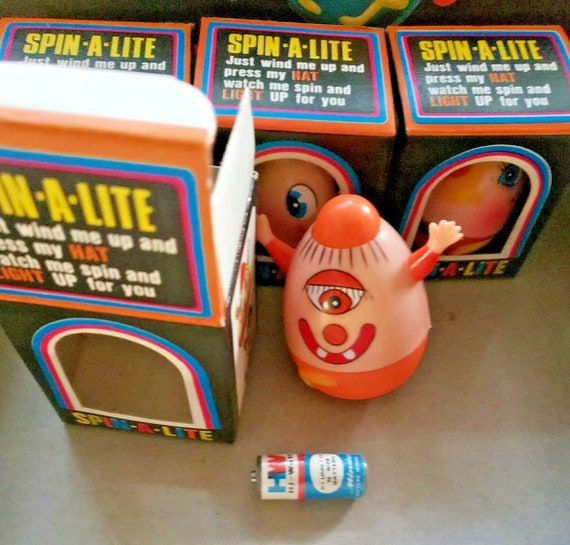 4 Spin A Lite Asst 2 Wind Up 1960 Battery Toy Old Stock 