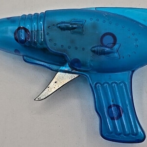Rare Pistolet Ray-gun Jadali Jack Dan – Métal Moulé Diecast, Jouet Mécanique France 1950