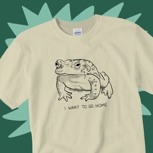 Funny frog tee, &quot;I want to go home&quot; frogs toad toads tshirt for gen z by Spellcast Studio