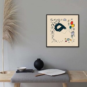 May include: A framed abstract art print with black lines and colorful shapes on a cream background. The print is in a black frame and is hanging on a gray wall.