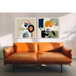 May include: Two framed abstract art prints featuring colourful geometric shapes and figures. The prints are hanging on a white wall above a brown leather sofa.