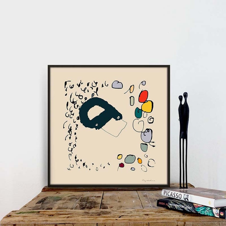 May include: A framed abstract art print with a black and teal shape, colorful circles, and black scribbles on a cream background. The print is titled "Clay Anderson".
