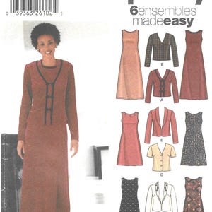 May include: Simplicity sewing pattern 5858 featuring six ensembles. The image shows a woman wearing a long-sleeved dress with black trim. The pattern includes various dress and jacket designs.