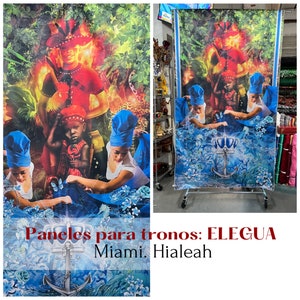 Könnte beinhalten: Ein farbenfroher Wandteppich mit einem blauen Anker- und Kronendesign. Der Wandteppich zeigt ein rotes, schwarzes und blaues Bild von drei Figuren. Der Text "Paneles para tronos: ELEGUA Miami. Hialeah" ist unten auf dem Wandteppich gedruckt.