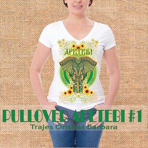 May include: White t-shirt with a green elephant design and the text "APETEB!" in green letters. The elephant is surrounded by sunflowers and white flowers. The text "PULLOVER APETEB! #1" is at the bottom of the image.