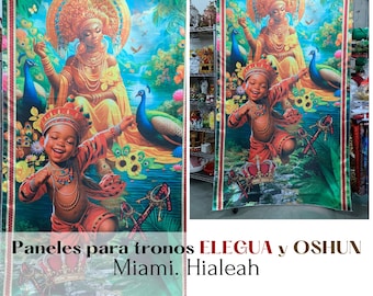 May include: Large, colorful fabric panel featuring a vibrant illustration of two figures, a woman and a child, with peacocks and floral elements. The text "ELEGUA y OSHUN" is visible. The panel has a green background with red and white striped borders.