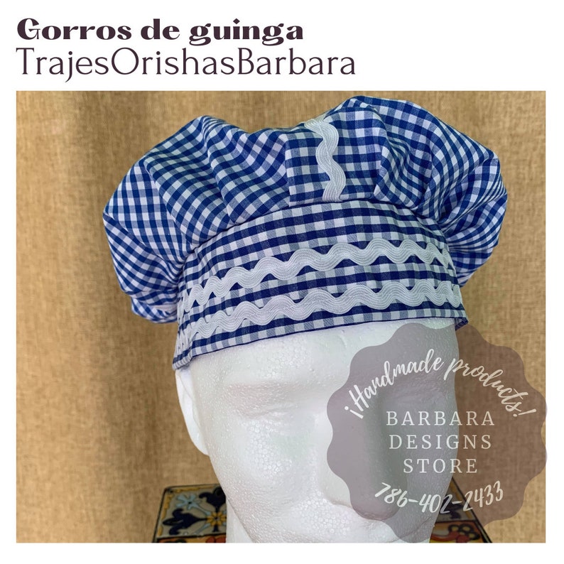 May include: Blue and white gingham chef's hat with white trim. The hat is on a white mannequin head. The text "!Handmade products! Barbara Designs Store 786-402-2433" is on a gray background.