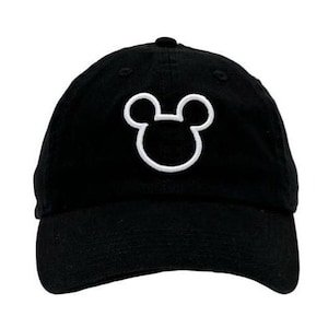 May include: A black baseball cap with a white embroidered Mickey Mouse silhouette.