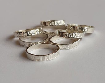 Silver children's rings with text
