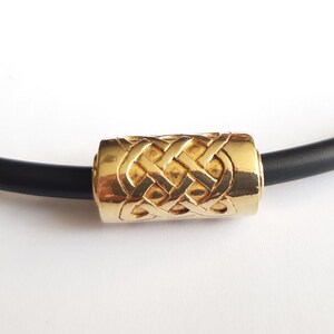 Celtic bead, silver gilded, with rubber spang