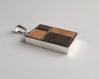 Silver pendant with wood