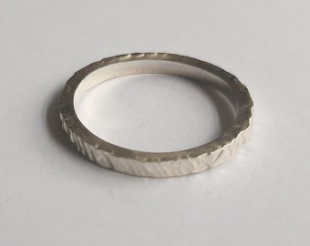 silver ring with hammered structure