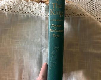 May include: A teal-colored book spine with gold lettering. The title "I, The King" and author Frances Parkinson Keyes are visible. The book is from the publisher, Messner Hall.