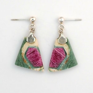 May include: A pair of silver earrings with green, pink, and white gemstone drops. The gemstones are triangular in shape and have a unique, marbled pattern.