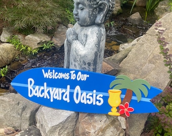 Backyard Oasis Wood Surfboard Sign, Surf Wall Hanging Decor for your Beach Inspired Patio Deck, Gift for the Tiki Bar and Luau Decorations