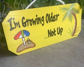 Growing Older… Not Up Custom Ceder Wooden Sign, Handmade Personalized Outdoor Tropical Decor Wall Hanger Sign, yellow 12” w/ painted accents