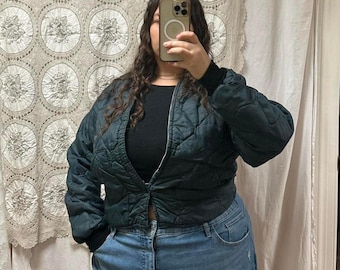 1970s Navy Quilted Jacket. Black Ribbed Neckline and Wrists. Tag