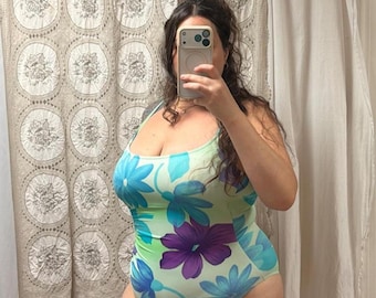 Cole of California Green Purple and Floral Tropical One Piece Swimsuit. Tag size 12. Nylon, Spandex. FAIR conditionMinor snags, Sun damage,