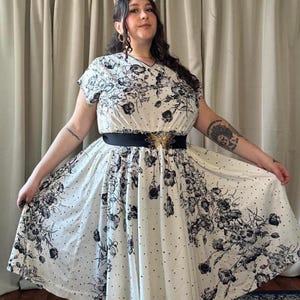 plus size vintage fit and flare dress [Plus Size] 1950s Multicolored Floral Flare Sleeve Dress main image 1