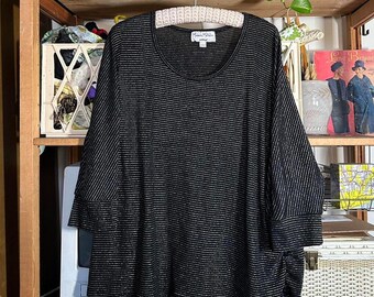 May include: Black and silver striped top with a scoop neck. The top has a relaxed fit and is made of a soft, comfortable fabric.