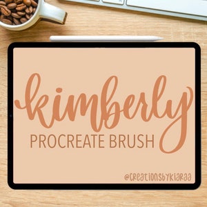 May include: A digital illustration of the word "kimberly" in a brown cursive font on a light brown background. The text "Procreate Brush" is below the word "kimberly" in a smaller font. The text "@creationsbykiaraa" is at the bottom of the image.