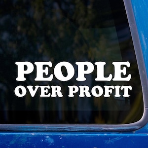 May include: A white vinyl sticker on a blue car window that reads "PEOPLE OVER PROFIT".