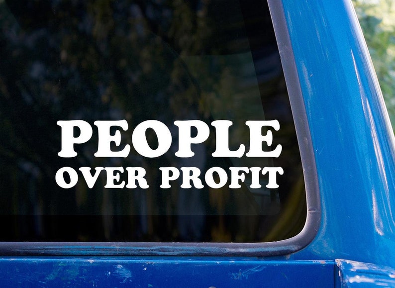 May include: A white vinyl sticker on a blue car window that reads "PEOPLE OVER PROFIT".