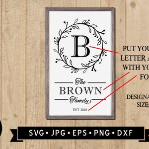 May include: A black and white printable sign with a wreath and the letter "B" in the center. The text "The BROWN Family EST 2018" is below the wreath. The sign is 12 inches by 20 inches.