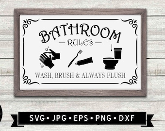 May include: A black and white sign with the text "Bathroom Rules" and illustrations of washing hands, brushing teeth, and flushing a toilet. The sign is framed in a brown wood frame.